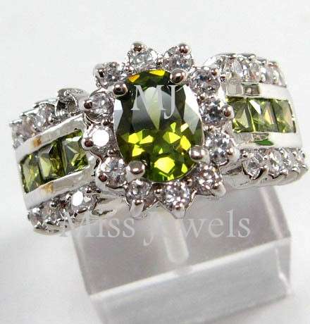 **Magnificent simulated green peridot and diamond dress ring**Size 10.5